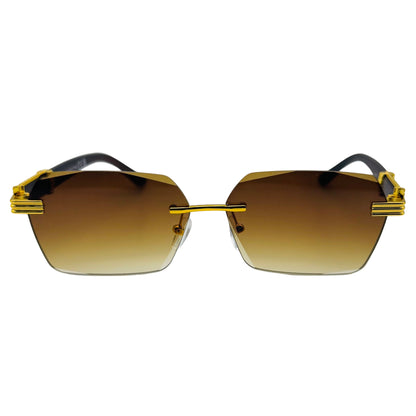 Gold-framed sunglasses with brown gradient lenses on a light gray background