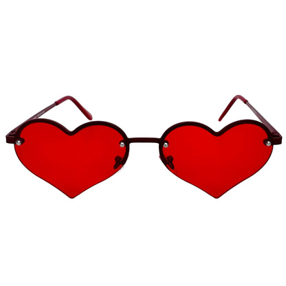 Heart-shaped sunglasses with red lenses on a light gray background