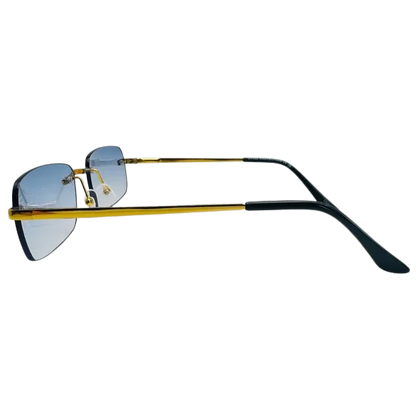 Sunglasses with gold frame and black arms on a white background