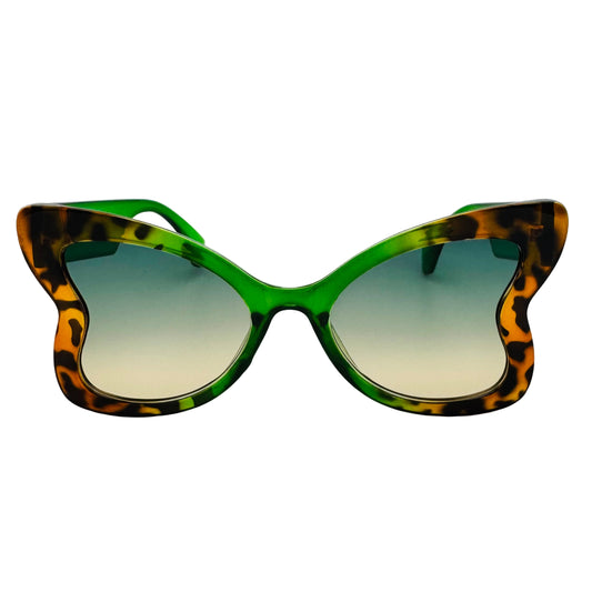 Sunglasses with green gradient lenses and tortoiseshell frame on a white background