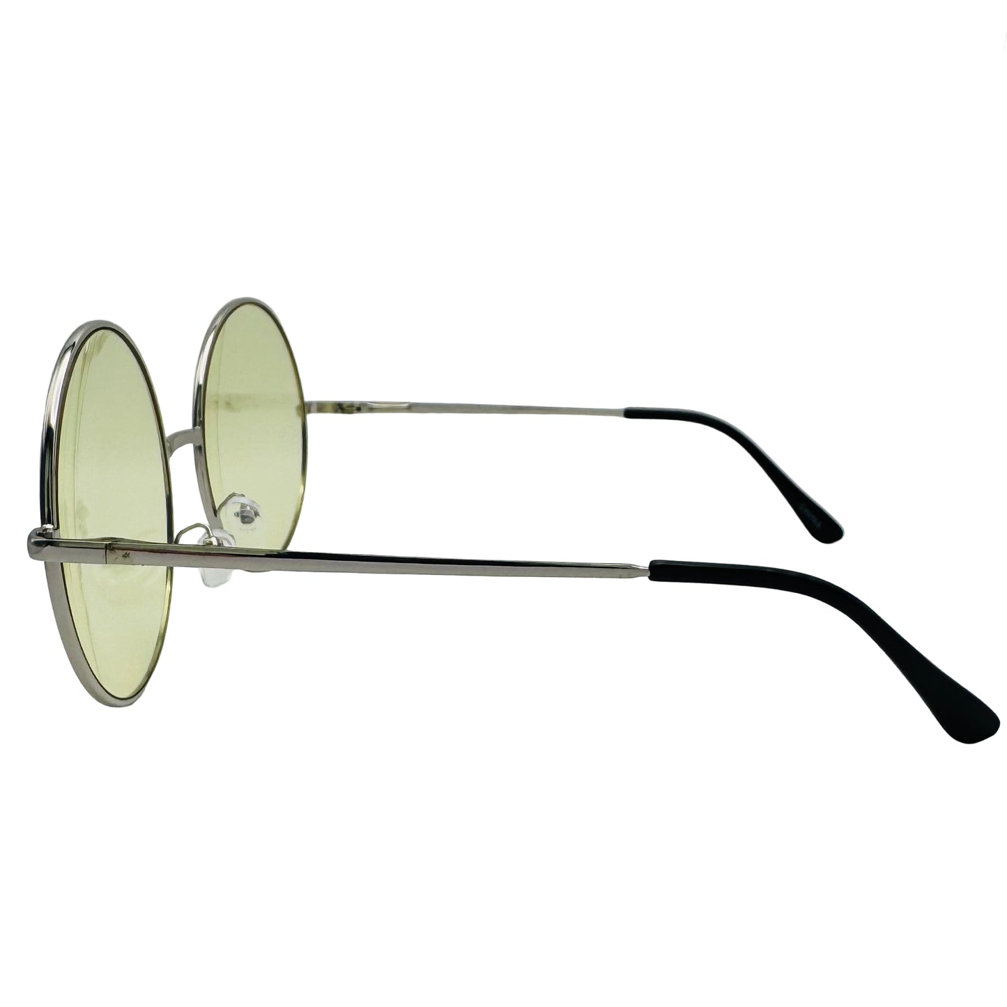 Round sunglasses with green lenses on a light gray background