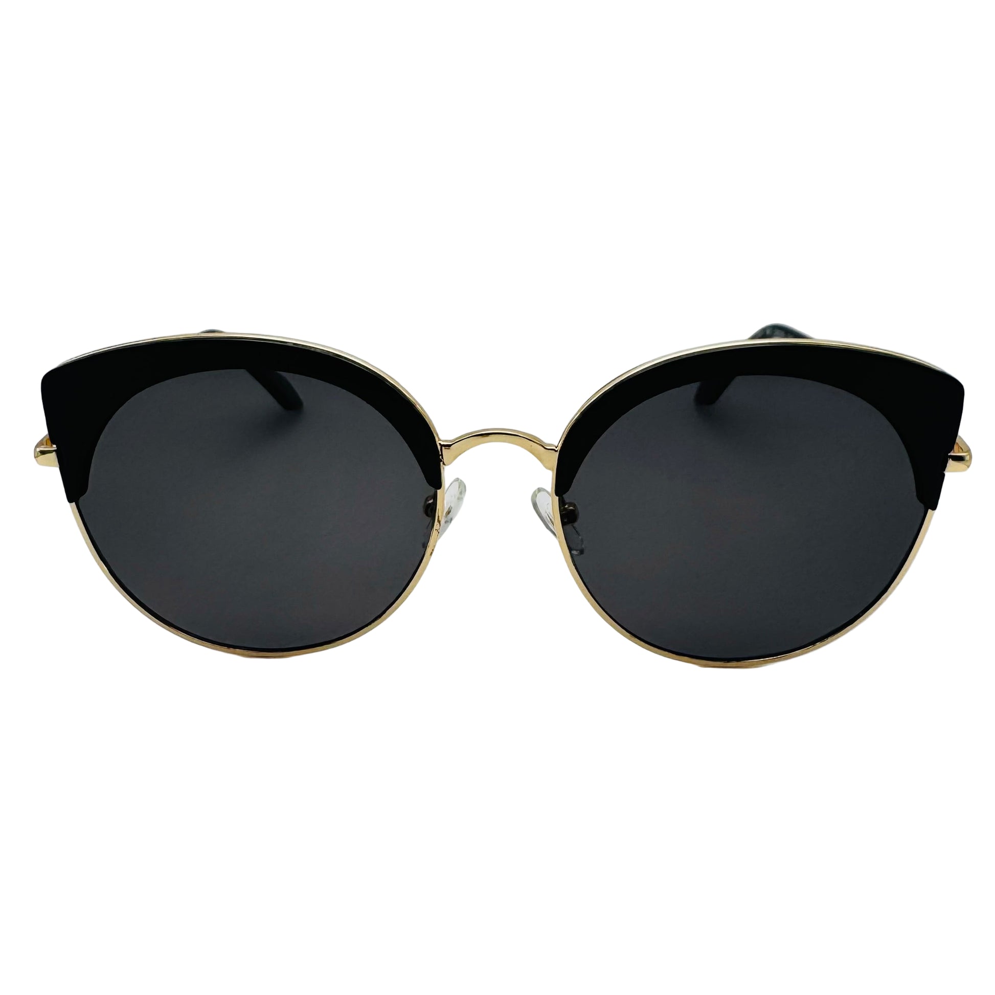 Sunglasses with black lenses and gold frames on a white background