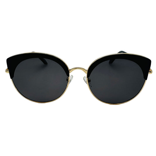 Sunglasses with black lenses and gold frames on a white background