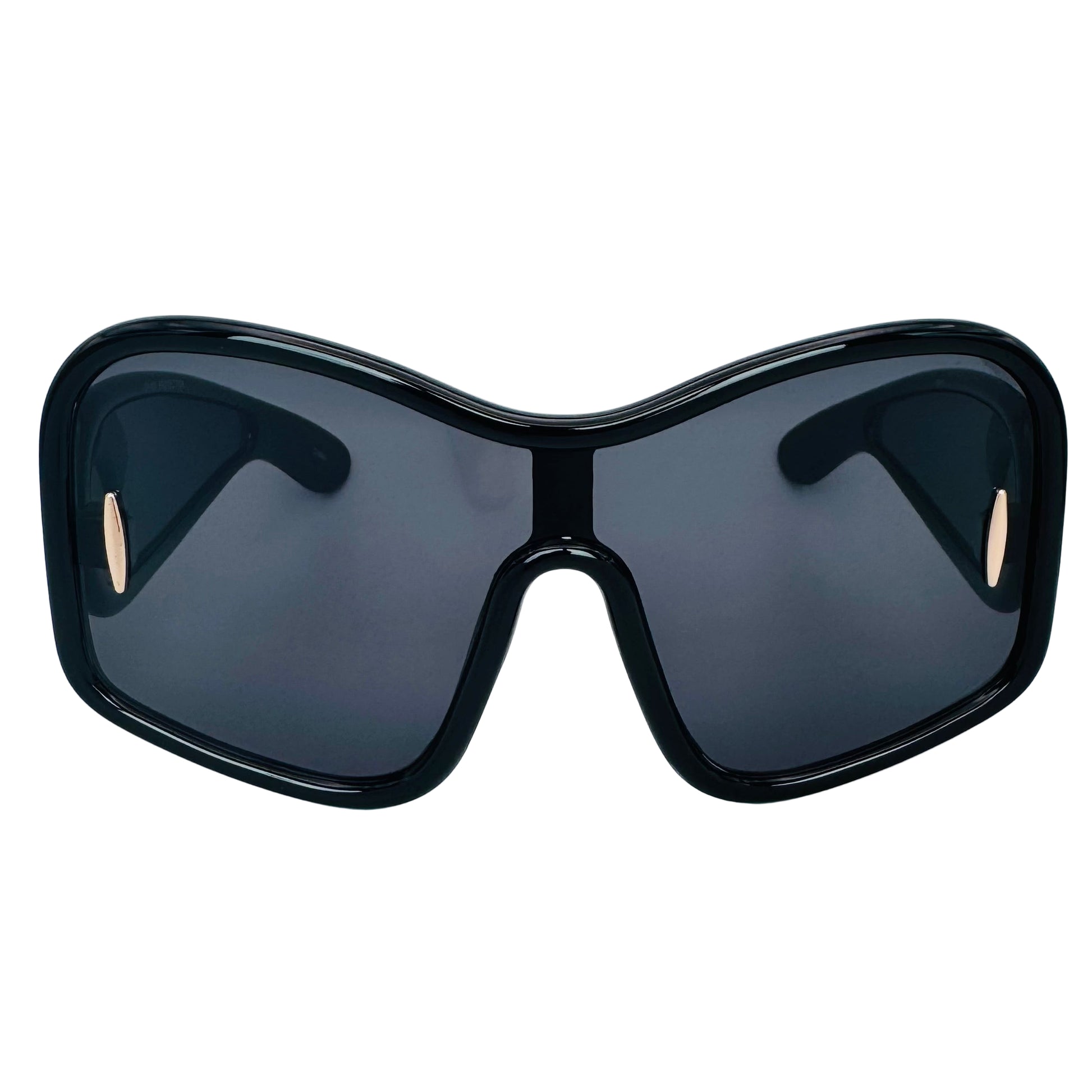 Black sunglasses with dark lenses on a light gray background