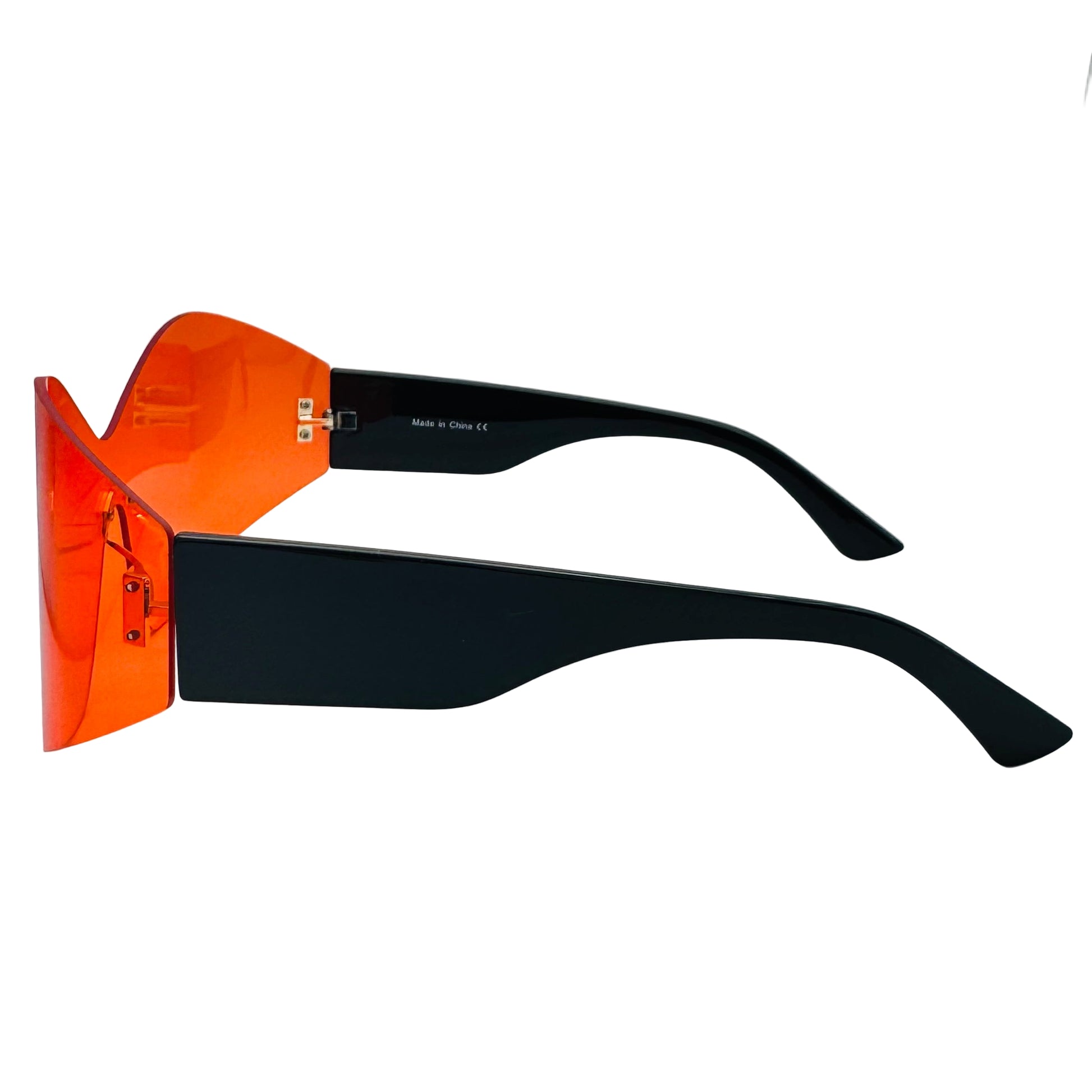 Sunglasses with orange lenses and black frames on a white background