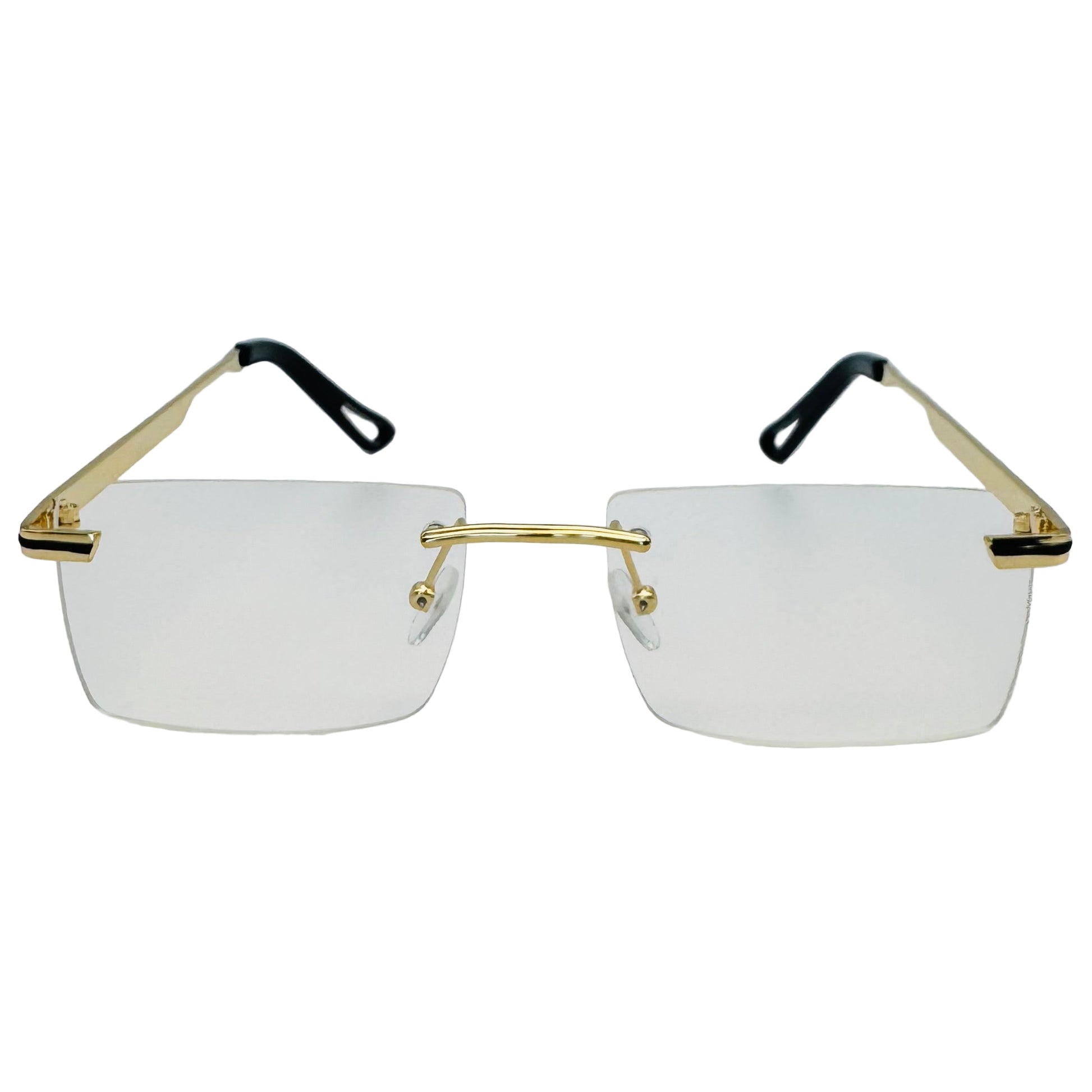 Gold-framed rimless glasses on a light gray background