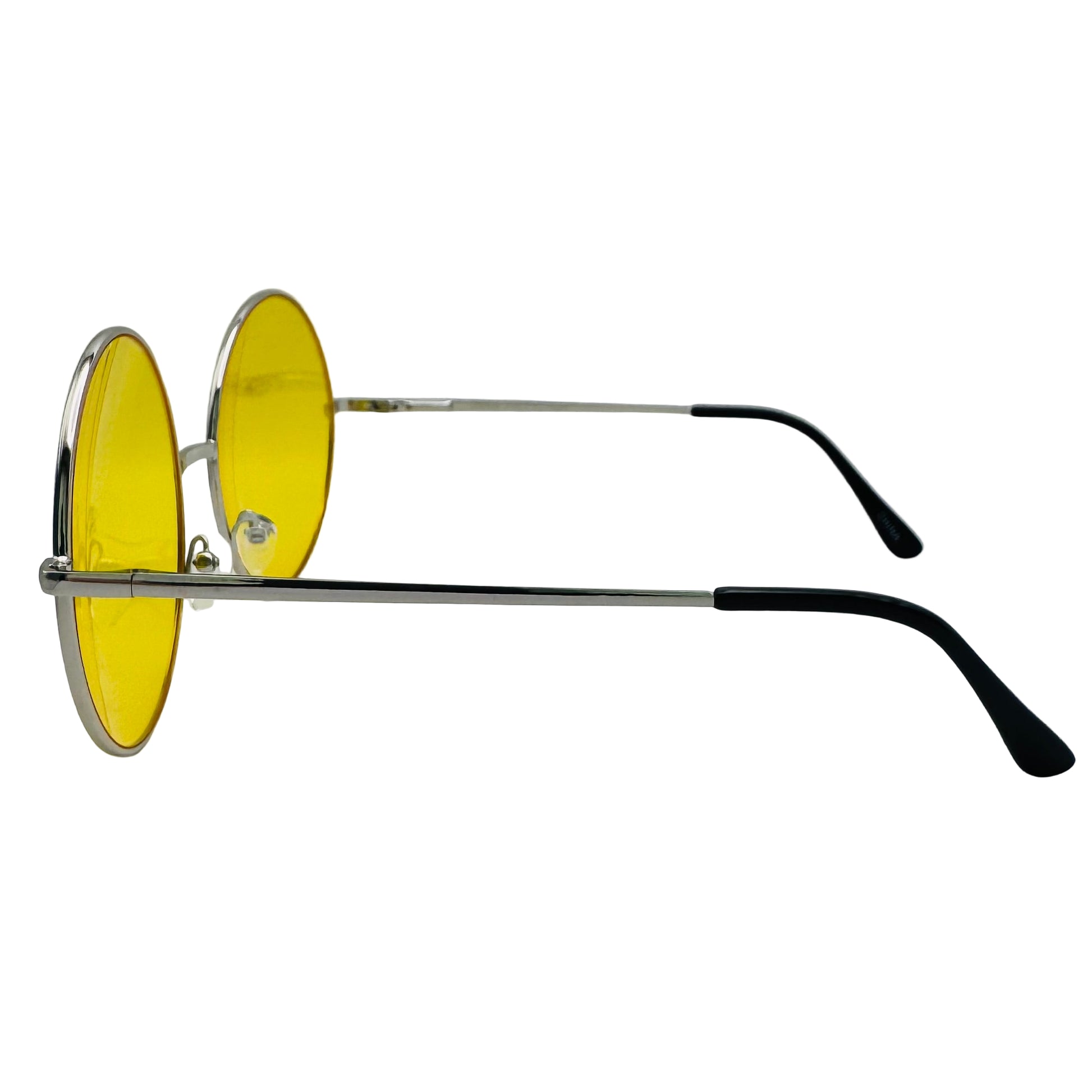 Sunglasses with yellow lenses and black frames on a light gray background
