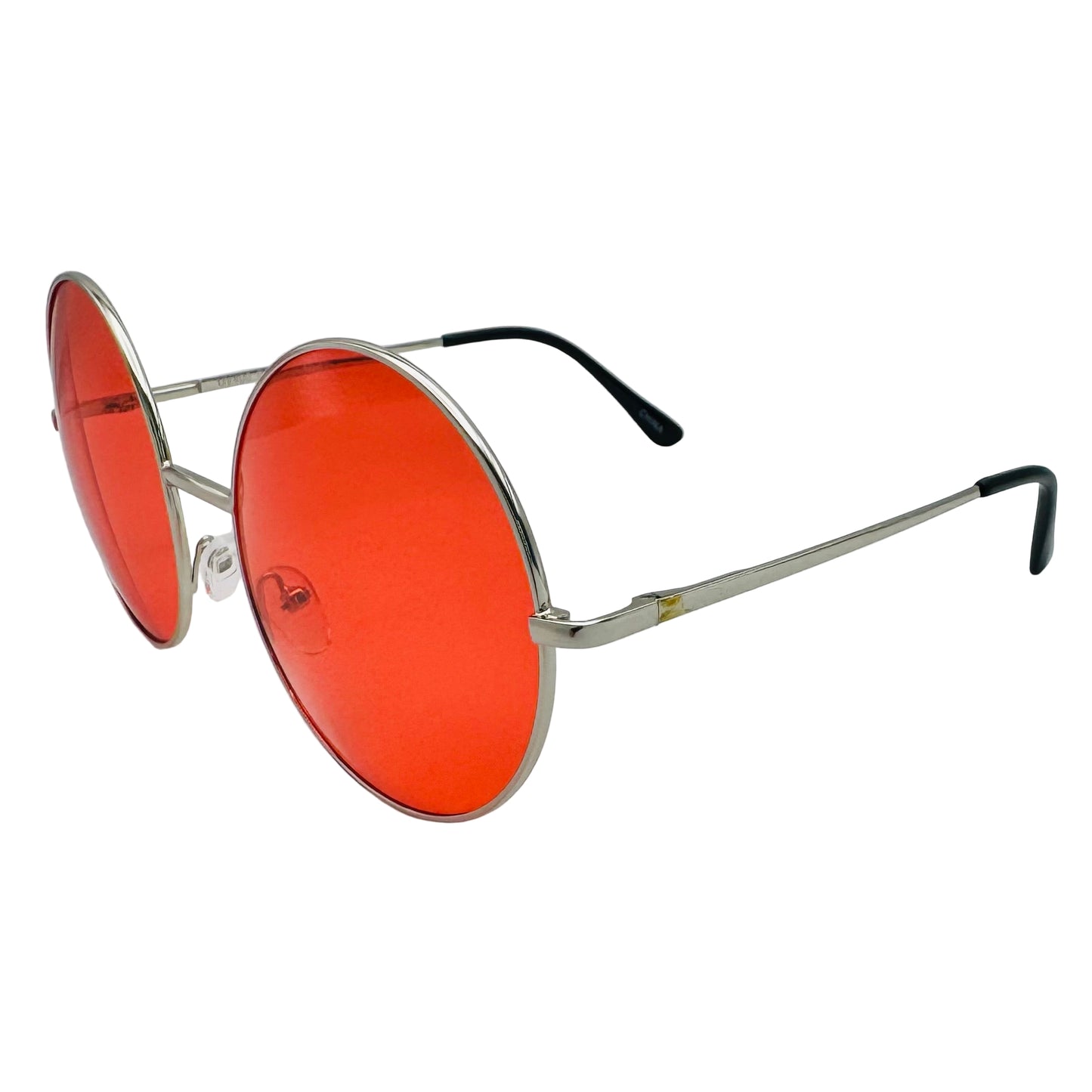Sunglasses with red lenses and silver frames on a light gray background