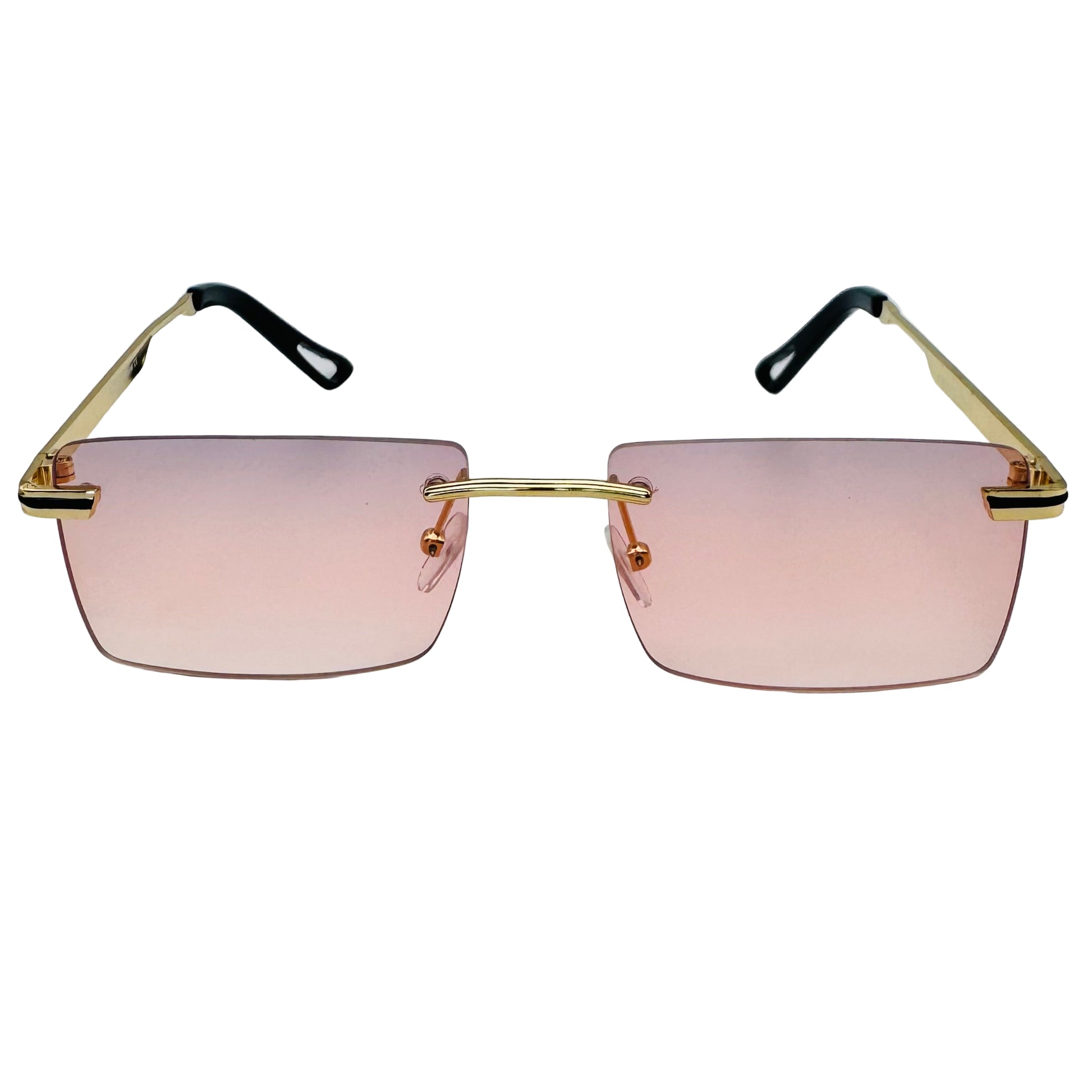 Sunglasses with gold frames and pink lenses on a light gray background