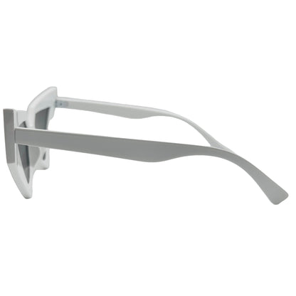 Silver sunglasses on a white surface with a light gray background