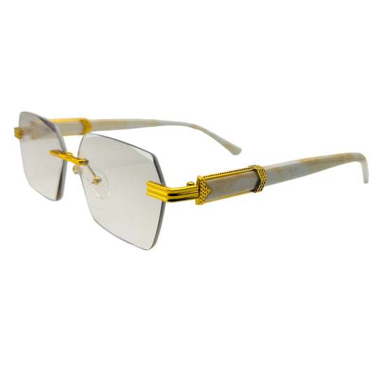 Gold-framed eyeglasses on a white background