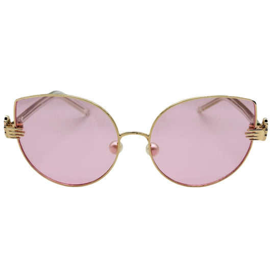 Gold-framed sunglasses with pink lenses on a white background