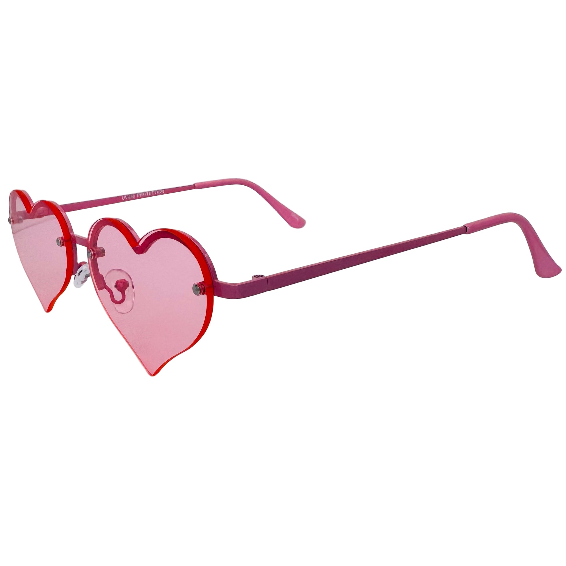 Heart-shaped sunglasses with pink frames on a light gray background