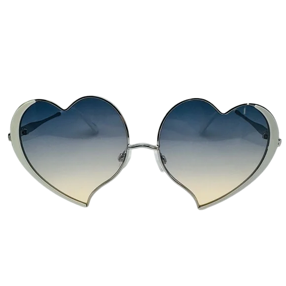 Heart-shaped sunglasses with gradient lenses on a white background