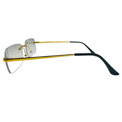 Gold-framed eyeglasses with black arms on a white background